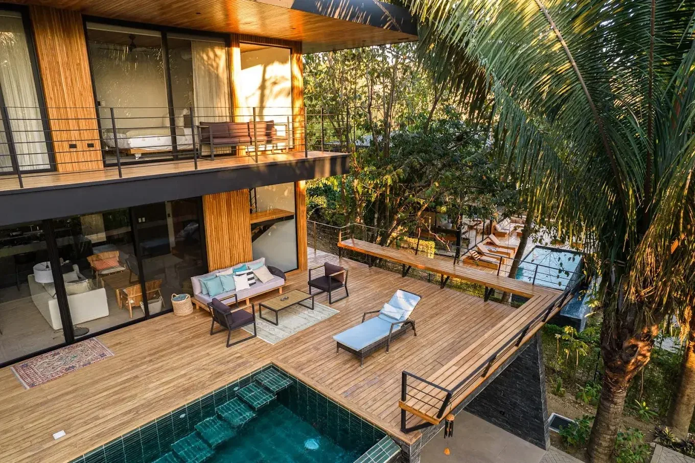 A finished home and pool among the palms at Yoko Village, Santa Teresa, Costa Rica